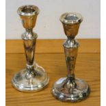 A silver pair of baluster candlesticks, Birmingham 1982, height 15 cm, loaded.