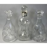 A pair of Victorian cut glass decanters, with mushroom stoppers, height 23 cm, together with another