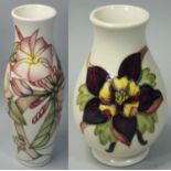 A Moorcroft vase of baluster form, tubeline decorated with pink orchids, date symbol of a 'key'
