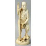 A Japanese Meiji period Ivory Okimono, in the form of a fisherman with spear, signed with green