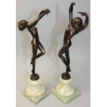 A pair of Art Deco style bronze dancing girl statues, signed Vivian, raised on green marble bases,