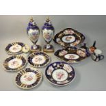 A collection of blue and white china to include a pair of lidded urns, height 30cm, together with