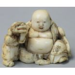 A Japanese Ivory Netsuke, carved with a fat man by a small man with an animal on his back, signed,