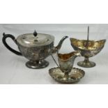 A Victorian four piece silver tea service, Martin & Hall/Walker & Hall, various Sheffield dates, tea