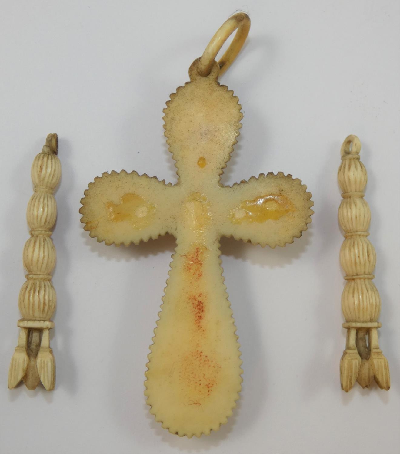 A Victorian carved ivory cross, decorated with roses, length 9 cm, together with a pair of carved - Image 2 of 2