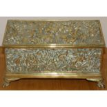A 19th century cast brass casket decorated with a stylish hunting scene in a wood, 28 x 14 x 13cm.