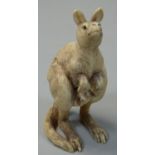 An Ivory statue of a kangaroo, with a Joey in its pouch, unsigned, height 8.5 cm.
