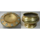 An Arts & Crafts brass and enamel pedestal bowl, with rope twist border, applied pale blue enamel