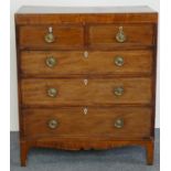 A Victorian mahogany and boxwood inlaid chest of two short over three long drawers, brass handles,