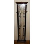 An Admiral Fitzroy oak cased barometer, of rectangular form, set with various thermometers,