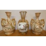 A pair of Royal Worcester blush ivory twin-handled vases of baluster form, with painted leaf