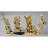 Four Japanese Ivory Okimono, two men with fruit , unsigned, height 10 cm, man with bird, man with