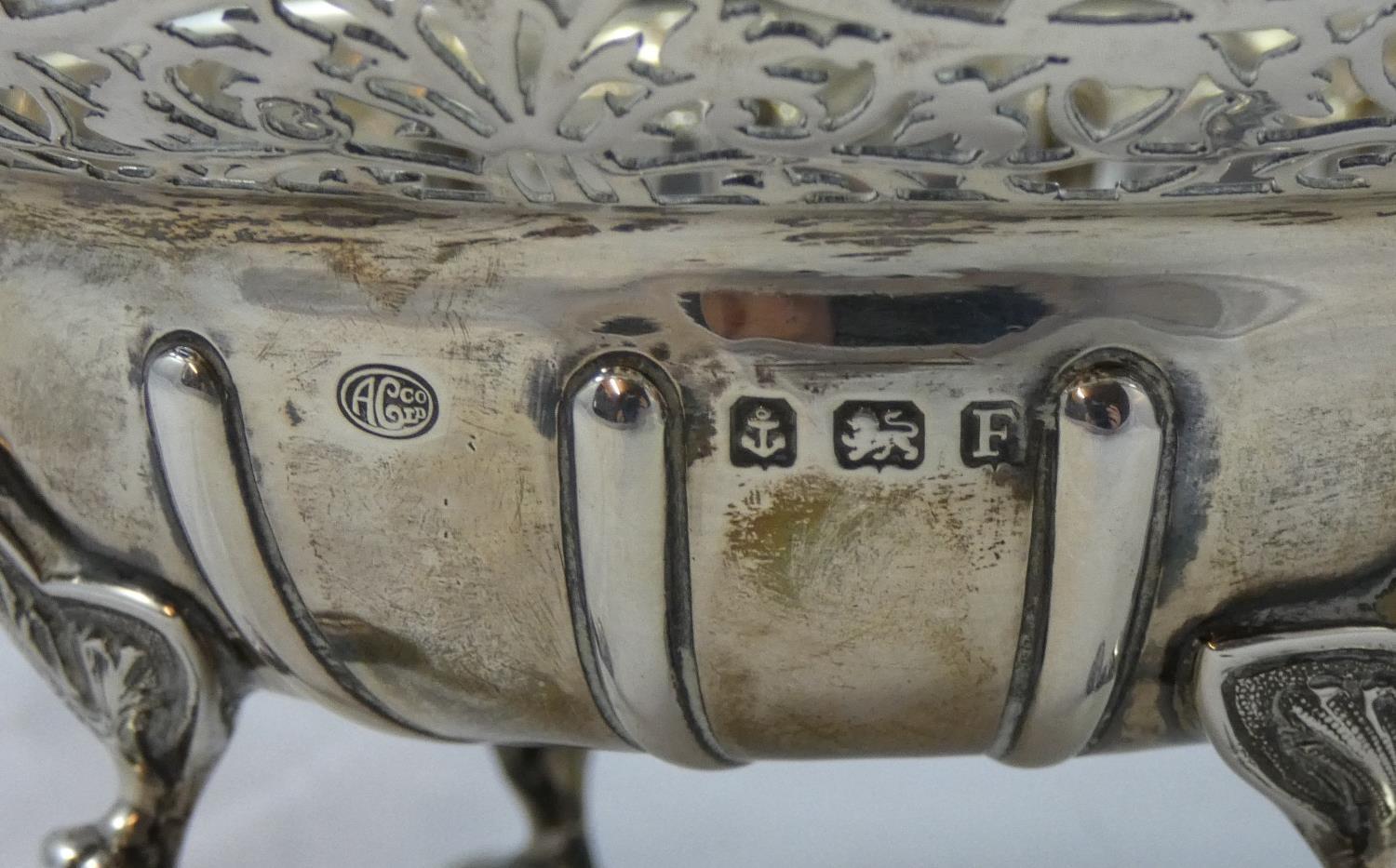 A silver fruit basket, by Alexander Clark & Co. Birmingham 1930, with pierced border, fluted bowl, - Image 2 of 2