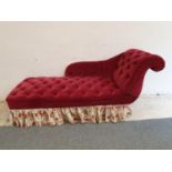 Property of a Baronet; a Victorian mahogany framed upholstered chaise longue, of three quarter form,
