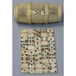 A 19th century Cantonese set of 25 novelty dominoes, contained within a pierced barrel, length 6 cm.