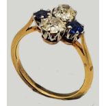 A synthetic sapphire and diamond dress ring, claw set with old cut stones, approximately 0.4 cts
