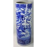 A Chinese blue and white stick stand, decorated with birds in a tree, double blue line to base,