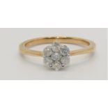 A diamond cluster ring, claw set with seven brilliant cut stones, weight approximately 0.50cts, size