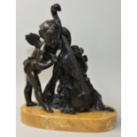 A French 19th century bronze figure of a cherub playing a chello, unsigned, mounted on a marble