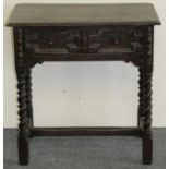 An 18th century style dark oak side table, with moulded frieze drawer and barley twist legs, 72 x 48