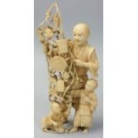 A Japanese Ivory Okimono, carved to depict a street vendor with his wares and two children,