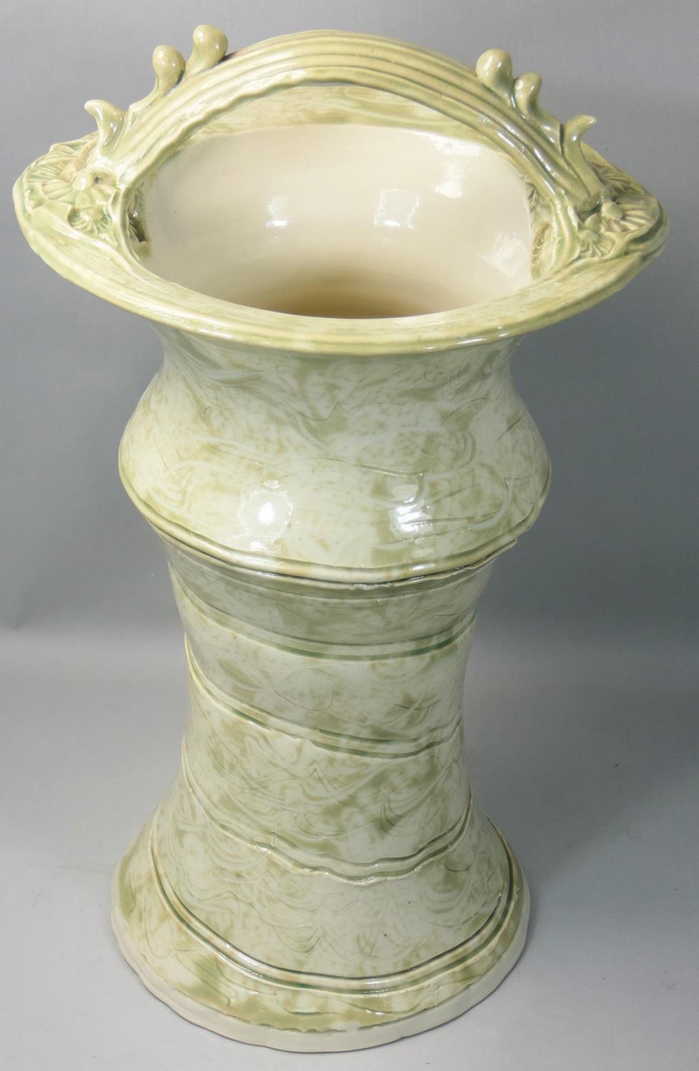 John Gibson, a large single handled vase, incised wavy decoration on a cream ground, impressed