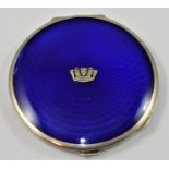 A silver and enamel circular compact, by Adie Bros for Gieves, Birmingham 1934, the blue enamel with