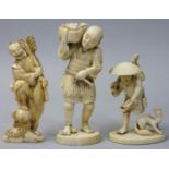 A Japanese Ivory Okimono, carved to depict a man carrying a basket of fish, signed, height 11 cm,
