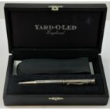 Yard o Led, a silver Regent propelling pencil, with engine turned decoration, leather case,