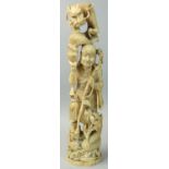 A Japanese ivory Okimono, in the form of a wise man holding a cup with dragon issuing from it,