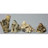 Four Japanese resin Netsuke, one as a lounging man (4).