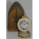 Ralco, an Art Deco desk gilt metal time piece, with signed silvered dial, mother of pearl bezel