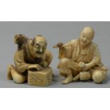 A Japanese Meiji period Ivory Okimono, carved to depict a man seated, unsigned, height 4.5 cm and