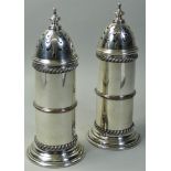 A Victorian pair of electroplated Lighthouse castors, with rope twist borders, height 21 cm.
