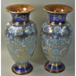 An Edwardian pair of Doulton Lambeth stoneware vases, impressed marks, c. 1902 - 1922, of baluster
