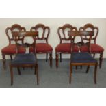 A Victorian set of four mahogany balloon back dining chairs, turned and fluted legs, upholstered