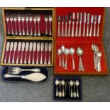 A decorative set of cased silver spoons and sugar tongs, together with a Mappin & Webb (Sheffield