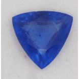 A heated treated and enhanced natural trillion shape sapphire, 9.40 cts, certificate.