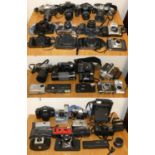 A large quantity of cameras including Olympus, Canon, Minolta, Miranda and Praktica, untested (4).