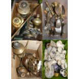 A quantity of brassware including oil lamps, trivet, candlesticks, gong, mincer and other items (4).