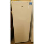 A Beko upright refrigerator, 145cm tall, 53cm wide.