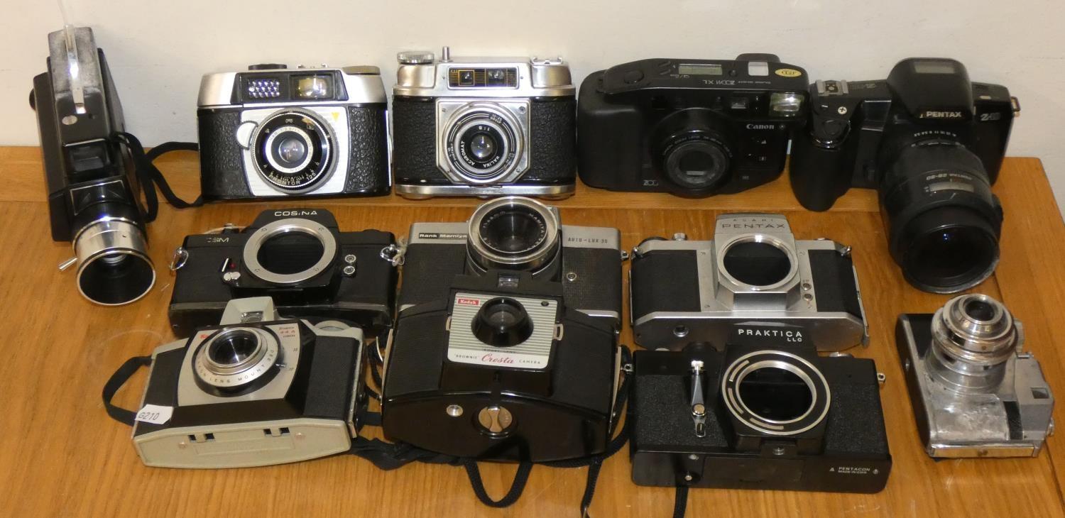 Three boxes of cameras, lenses and spares including Kodak, Pentax, Brownie Box and others, untested. - Image 3 of 4