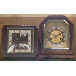 An Edwardian walnut cased manual wind mantle clock, Roman numerals, together with an oak cased