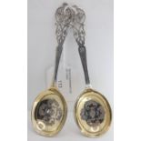 A pair of silver preserve spoons, Sheffield 1905, with pierced terminals, 1.5 oz.