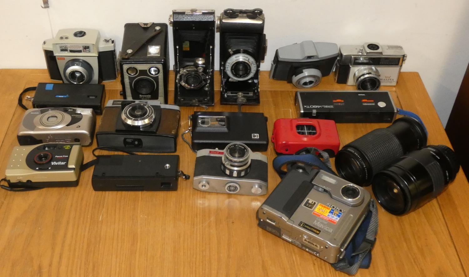 Three boxes of cameras, lenses and spares including Kodak, Pentax, Brownie Box and others, untested. - Image 2 of 4