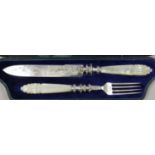 A Victorian silver plate and mother of pearl knife and fork, with fruit engraved decoration,
