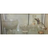A pair of moulded glass fruit bowls, together with a pair of glass decanters including a novelty