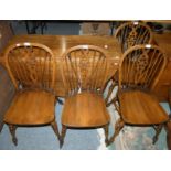 An oak dropleaf dining table, together with a set of four matching oak chairs (5).