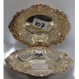 A silver pair of pin trays, London 1962, of oval pierced and embossed form, 15 x 13 cm, 5.5 oz.