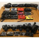 Four boxes of miscellaneous cameras and equipment including Olympus CM30, Canon AV1, Pentax 105-R